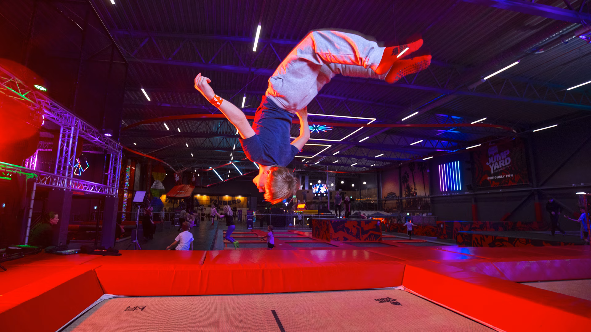 Fun Unleashed - Boy is doing backflip